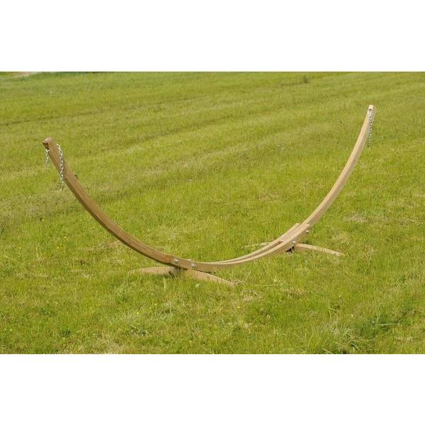 Wooden hammock stand on a grassy field