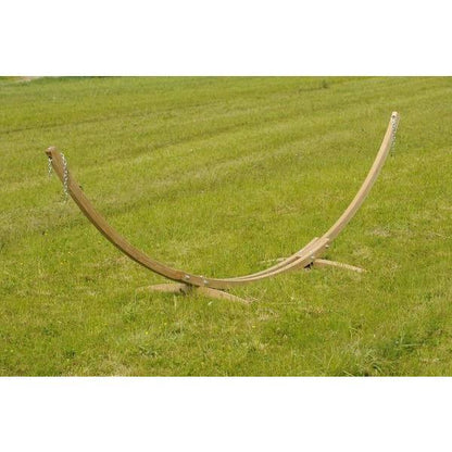 Wooden hammock stand on a grassy field