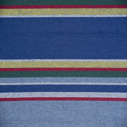 Close-up of fabric with multicolored stripes on a blue background