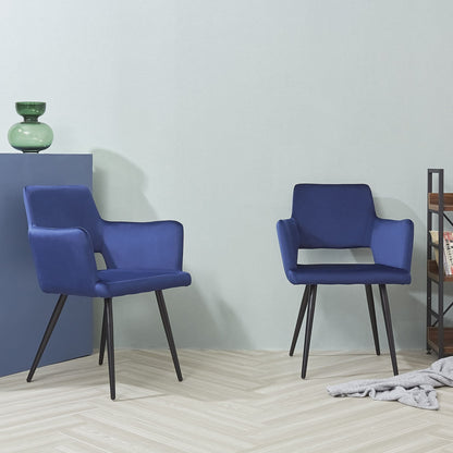 Two blue chairs with black legs in a room with a light gray wall and wooden floor.