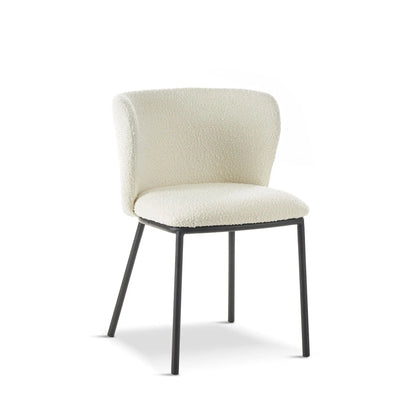 Beige chair with black legs on a white background