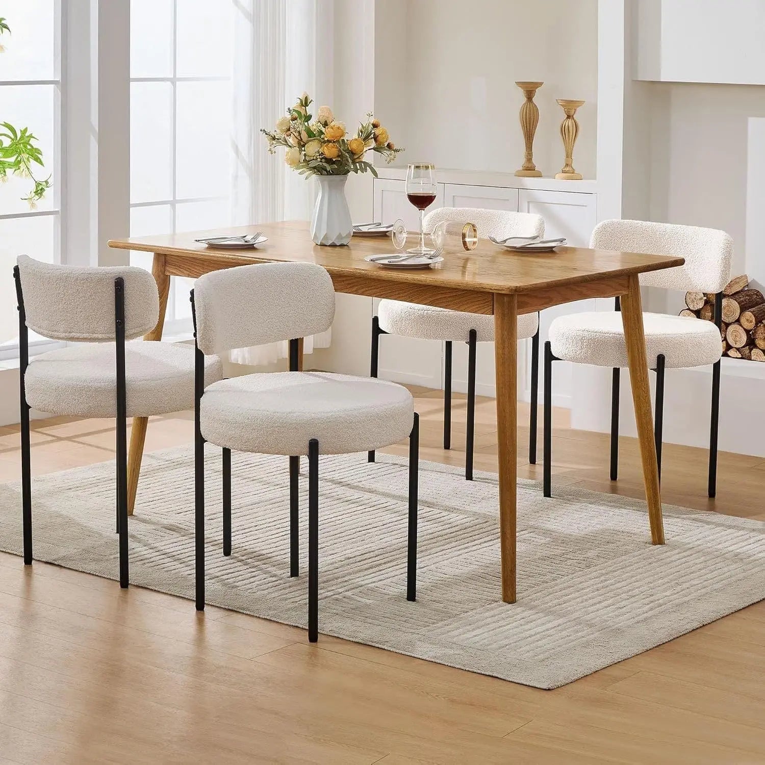 Dining room with wooden table and chairs on a rug