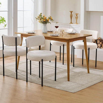 Dining room with wooden table and chairs on a rug